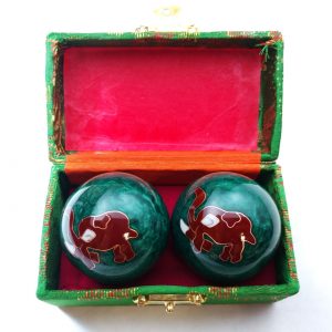 Green baoding balls with elephant design in a box