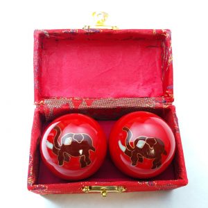 Red baoding balls with elephant design in a box