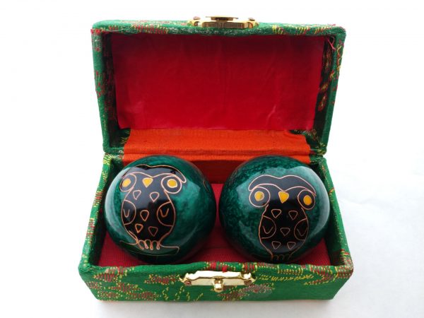 Green baoding balls with owl design in a box