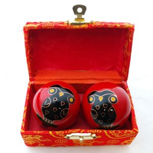 Red baoding balls with owl design in a box
