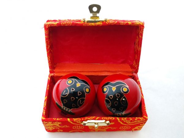 Red baoding balls with owl design in a box