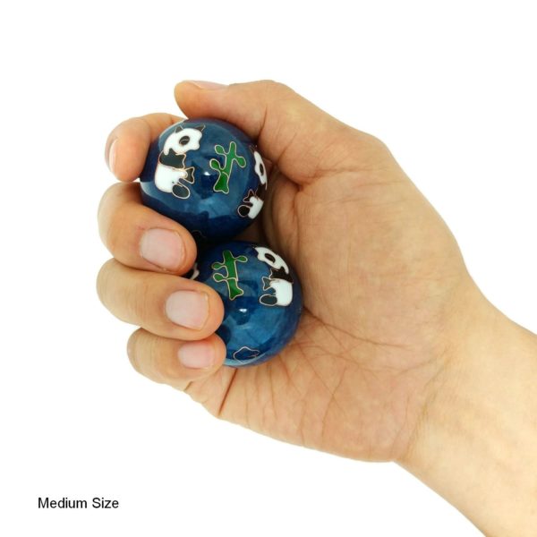 Hand holding medium panda baoding balls