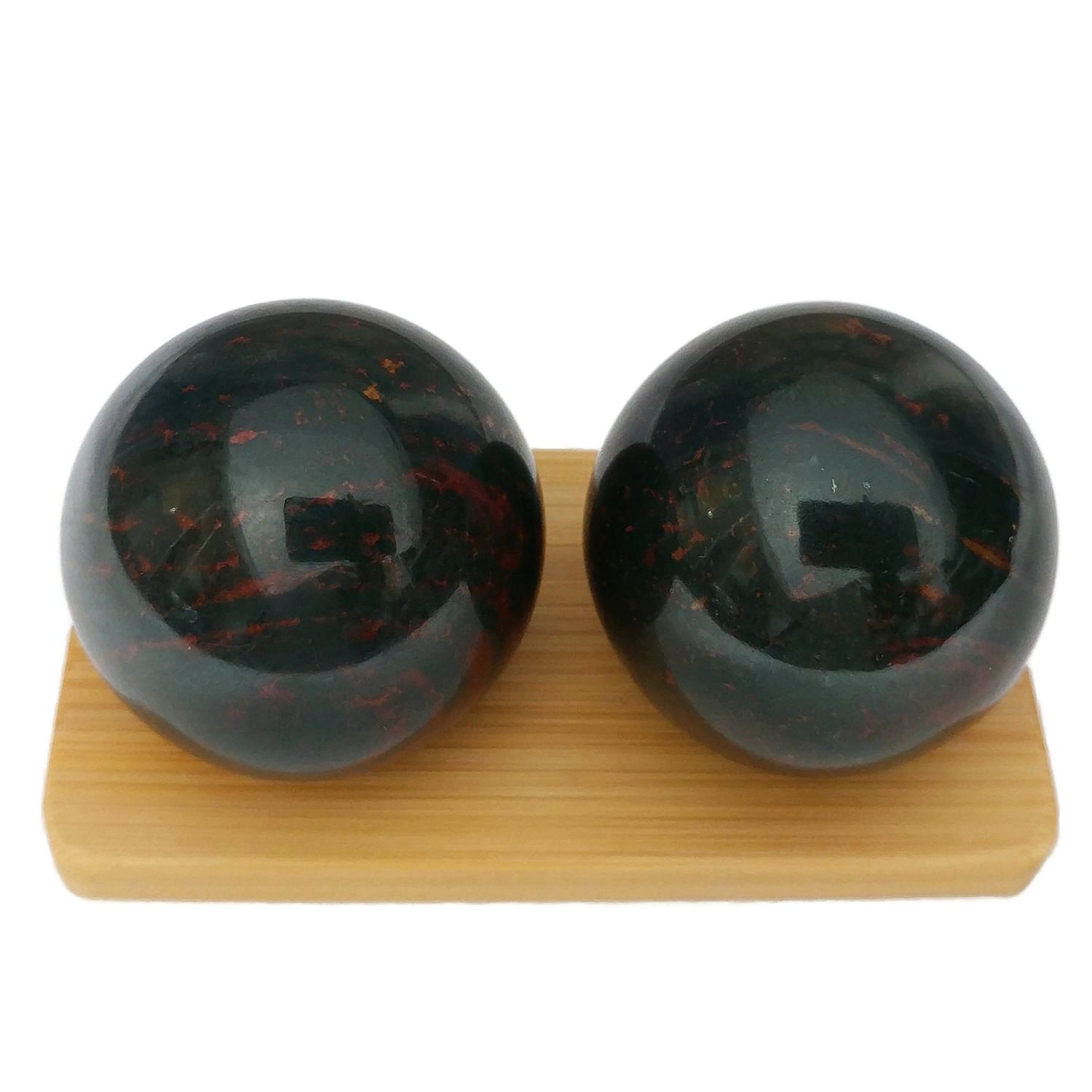 Bloodstone baoding balls on a bamboo stand
