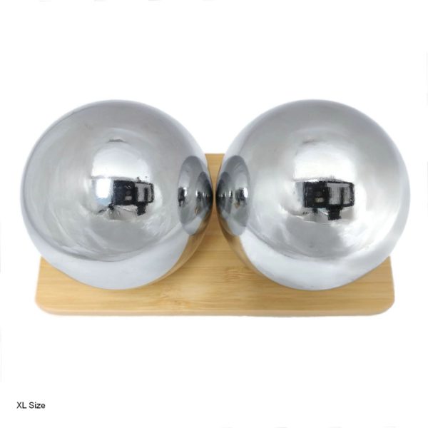 Extra Large Chrome Chiming Baoding Balls on a display stand