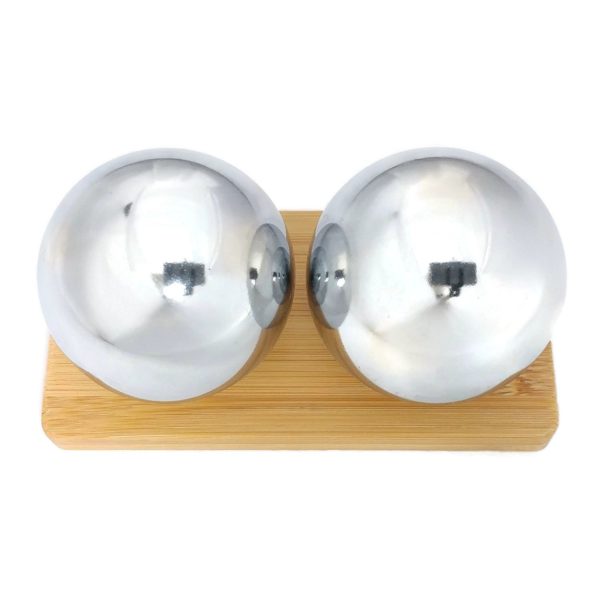 Chrome baoding balls on bamboo stand