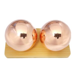 Copper baoding balls on bamboo display stand
