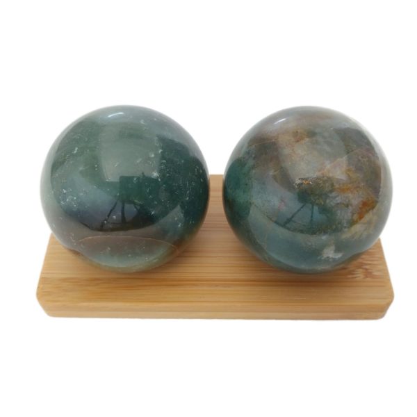 Fancy jasper baoding balls on a bamboo display stand