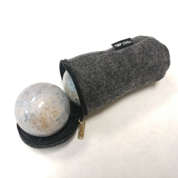 Baoding balls made from fancy jasper gemstone in a carry bag