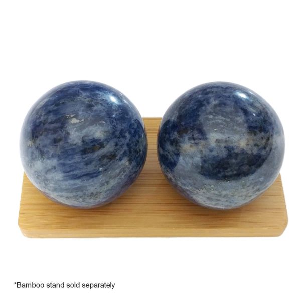 Sodalite baoding balls on a display stand