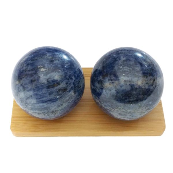 Sodalite baoding balls on a display stand