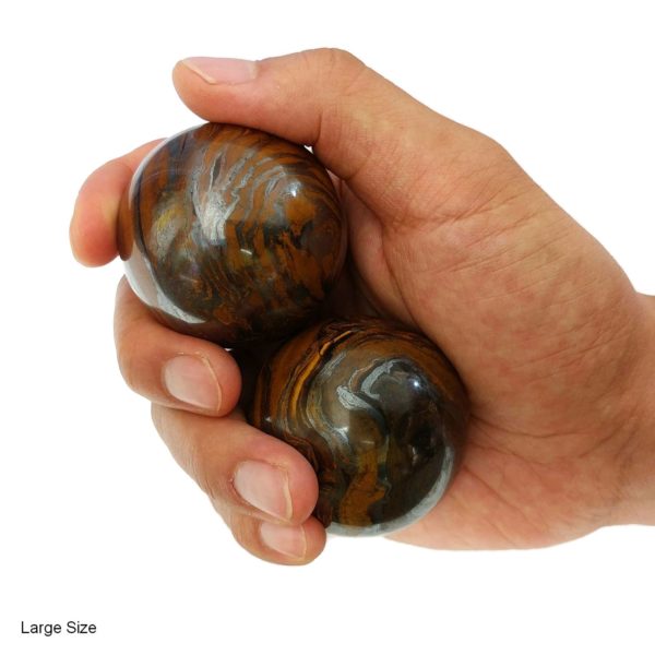 Hand holding tiger iron baoding balls