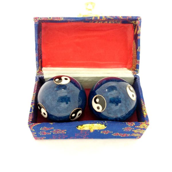 Blue yin yang baoding balls in a box