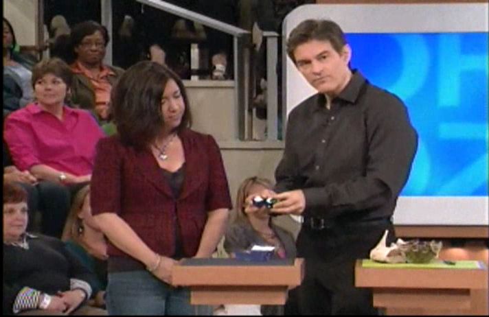 Dr Oz holding baoding balls