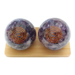 Large amethyst orgonite baoding balls on display stand