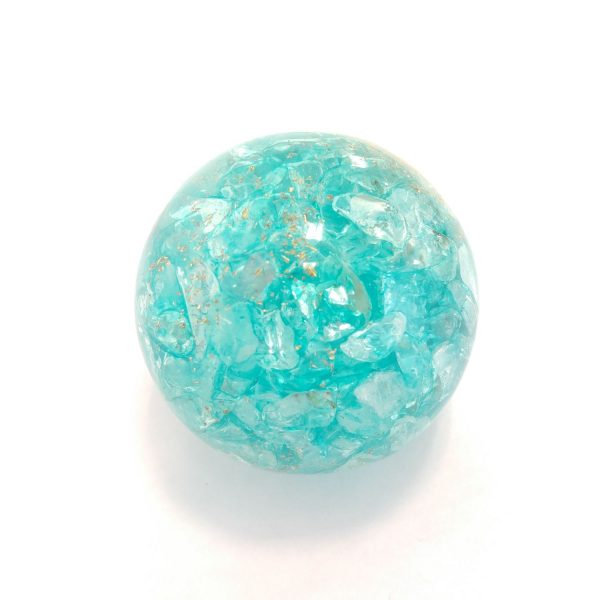 Single aquamarine orgonite ball showing the back