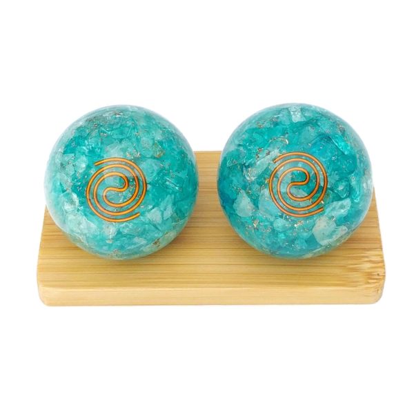 Aquamarine quartz orgonite baoding balls on display stand