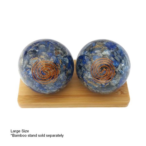 Lapis lazuli orgonite baoding balls on a display stand