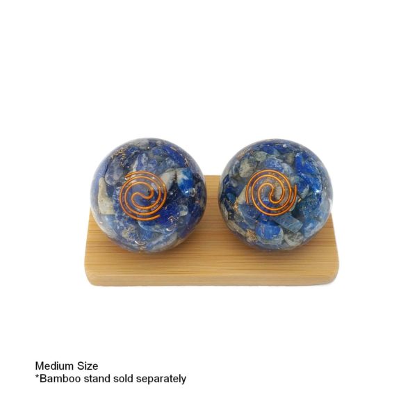 Lapis lazuli orgonite baoding balls on a display stand