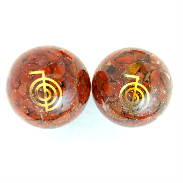 Two red jasper orgonite baoding balls with reiki power designs