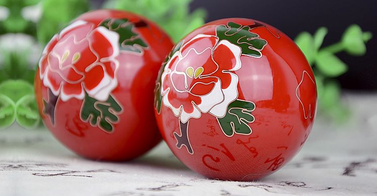 Pair of red cloisonne peony baoding balls