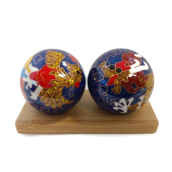 Baoding balls displayed on bamboo stands