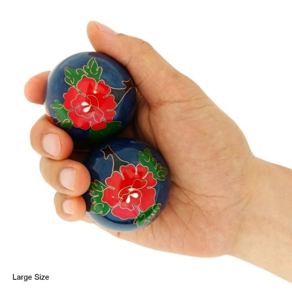 Hand holding large peony baoding balls