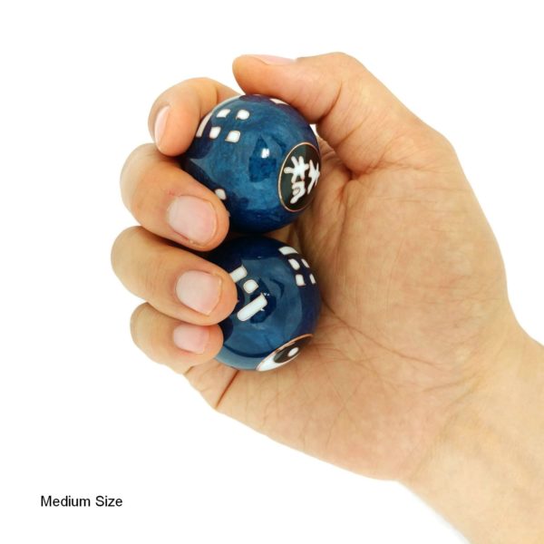 Hand holding medium size tai chi baoding balls