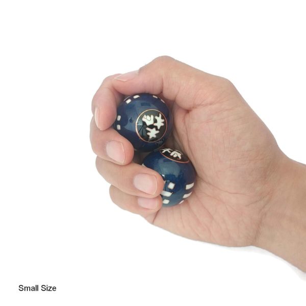 Hand holding small tai chi baoding balls