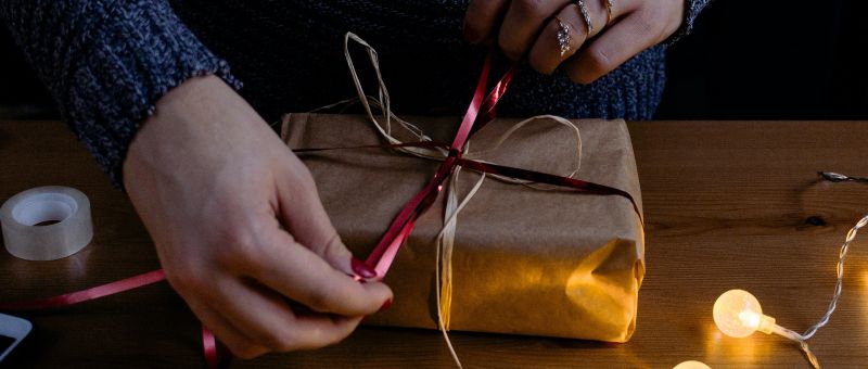 Person wrapping gift