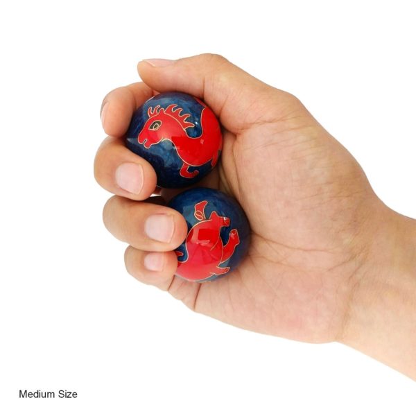 Hand holding horse baoding balls