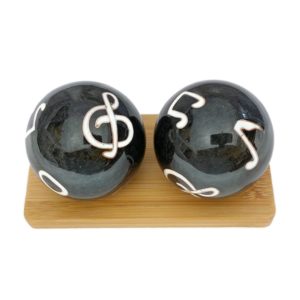 Music symbol baoding balls on a bamboo display stand