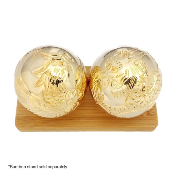 Gold baoding balls on a display stand