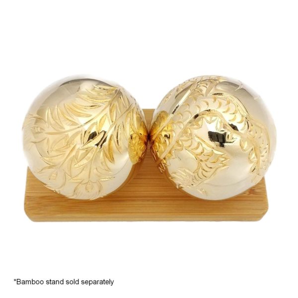 Gold baoding balls on a display stand