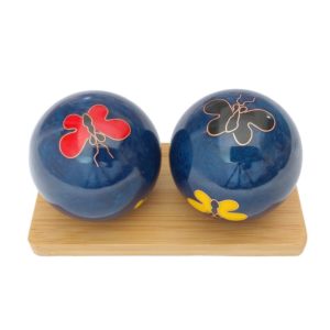 Butteryfly baoding balls on a display stand