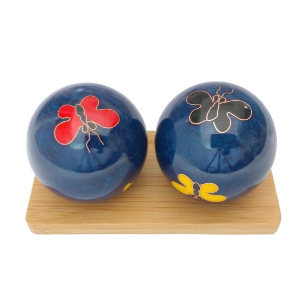 Butteryfly baoding balls on a display stand