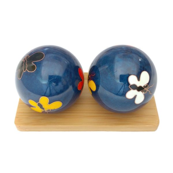 Butteryfly baoding balls on a display stand