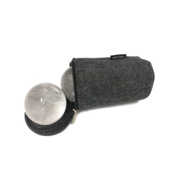 Clear quartz baoding balls in a carry bag