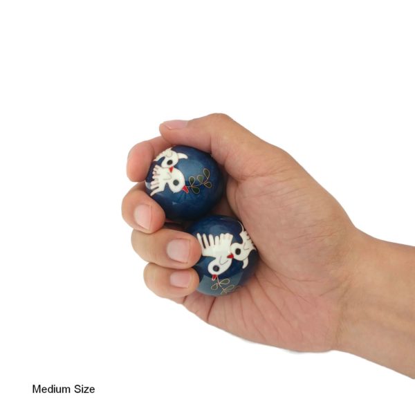 Hand holding medium dove baoding balls