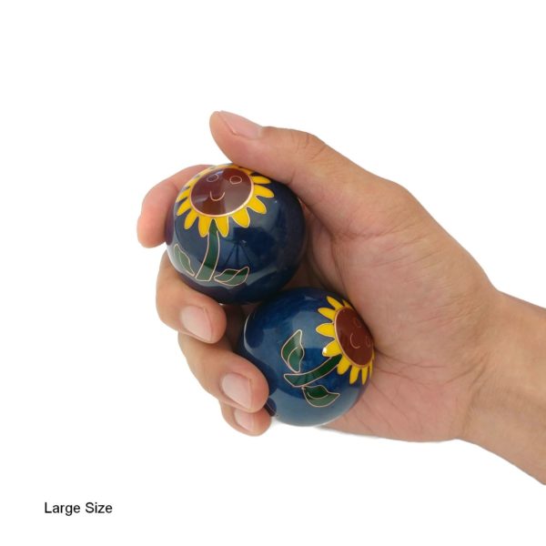 Hand holding large sunflower baoding balls