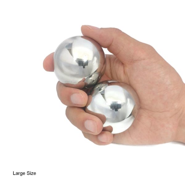 Hand holding stainless steel baoding balls