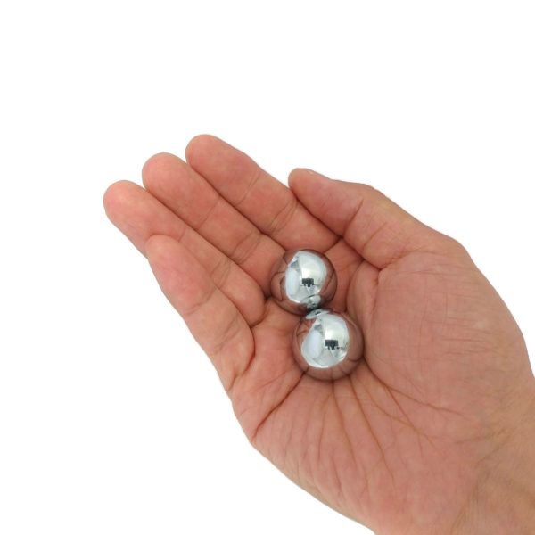 Hand holding 1 inch baoding balls
