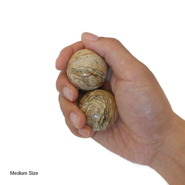 Hand holding medium picture jasper baoding balls