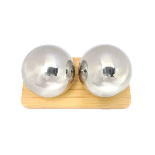 Stainless steel baoding balls on a display stand